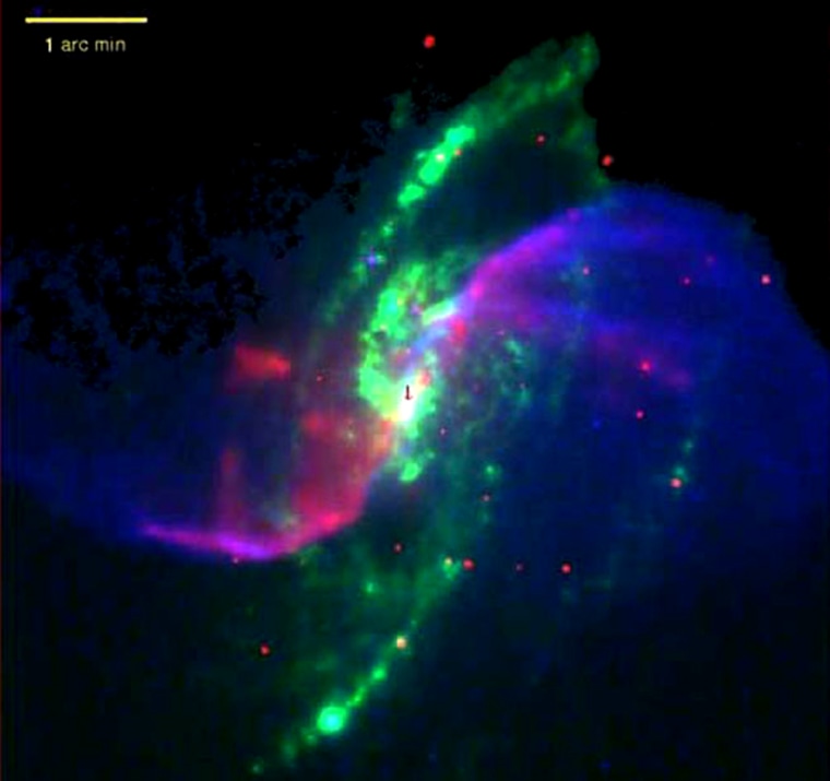 In this composite image of spiral galaxy M106, optical data is shown as yellow, radio data from the Very Large Array appears as purple, X-ray data from Chandra is coded blue and infrared data from the Spitzer Space Telescope appears red. The anomalous arms appear as purple and blue emission.