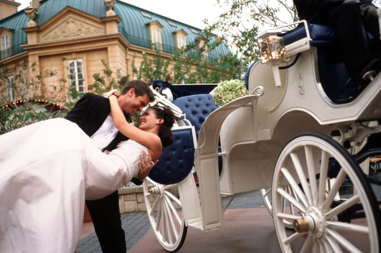 An undated publicity photo provided by the Walt Disney Company shows models appearing as participants in the Disney Fairy Tale Wedding at the Magic Kingdom in Walt Disney World