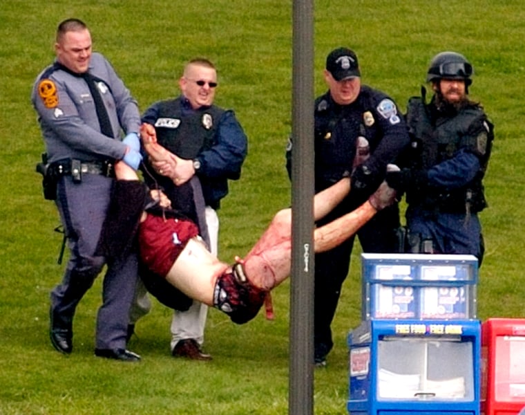 Virginia Tech student Kevin Sterne is carried out of Norris Hall on Monday, April 16, 2007.(AP Photo/The Roanoke Times, Alan Kim)
