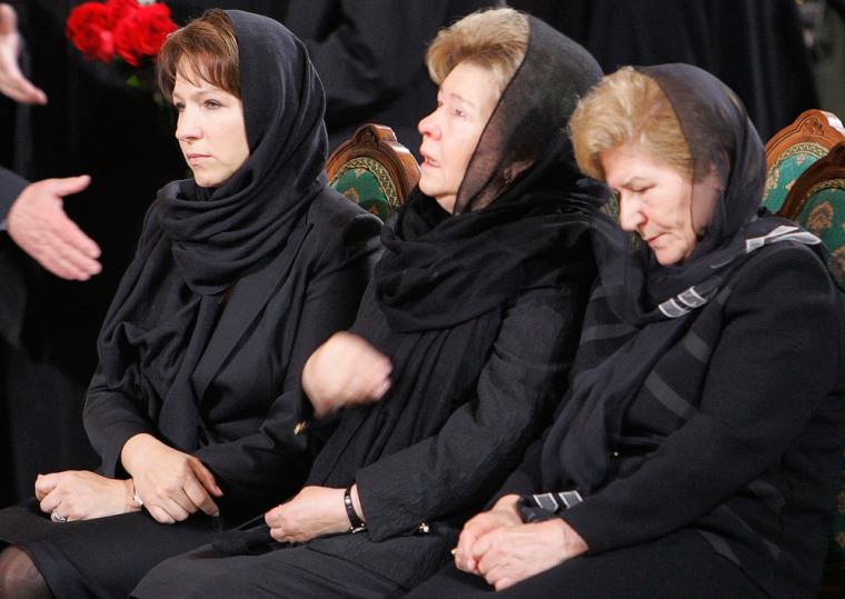 Former President Boris Yeltsin's widow Naina, his daughter Tatyana and an unidentified woman woman attend Yeltsin's funeral service in Moscow