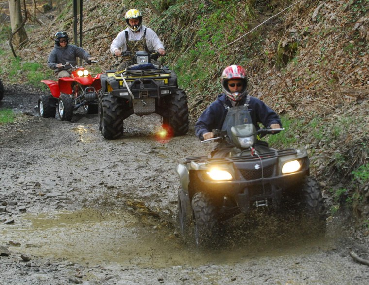 ATV riders ride on the Hatfield-McCoy Trails near Man, W.Va. The Hatfield-McCoy Trail System totals over 500 miles of off-road trails in nine southern West Virginia counties.