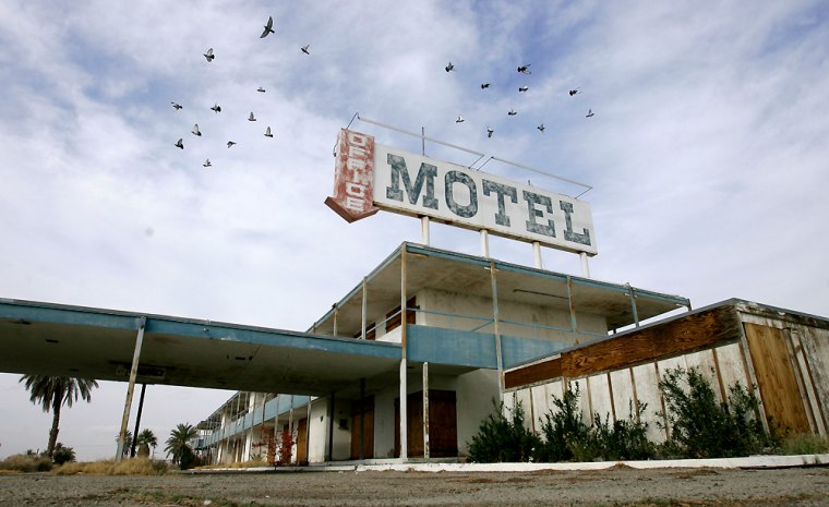 An abandoned motel sits on the edge on of the Salton Sea in North Shore, Calif., Tuesday, Dec. 16, 2006. The Salton Sea, California's largest lake was created in 1905 when floodwaters from the Colorado River burst past a series of dams and settled in the Salton Sink, more than 228 feet below sea level. Ever since, the lake has supported a complex ecosystem. (AP Photo/Chris Carlson)