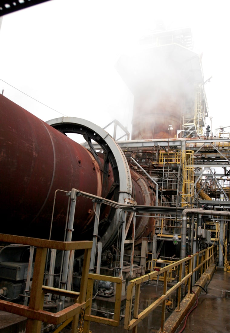 Steam from cooling towers rises above the rotary kiln as waste water from VX nerve agent is incinerated at Veolia Environmental Services in Port Arthur, Texas, Wednesday, April 25, 2007. Some residents are protesting the incineration of the waste water, saying it is dangerous. New Jersey and Ohio fought off plans to incinerate the waste there. In Port Arthur, Army and city officials did not announce the project until the deal was done. (AP Photo/Pat Sullivan)