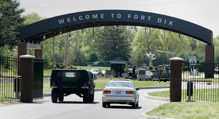 A vehicle entry gate is shown at Fort Dix