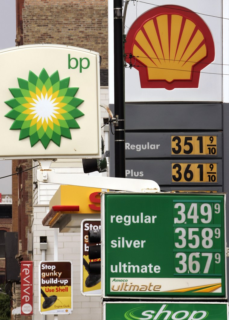Rising gas prices are posted on two Chic