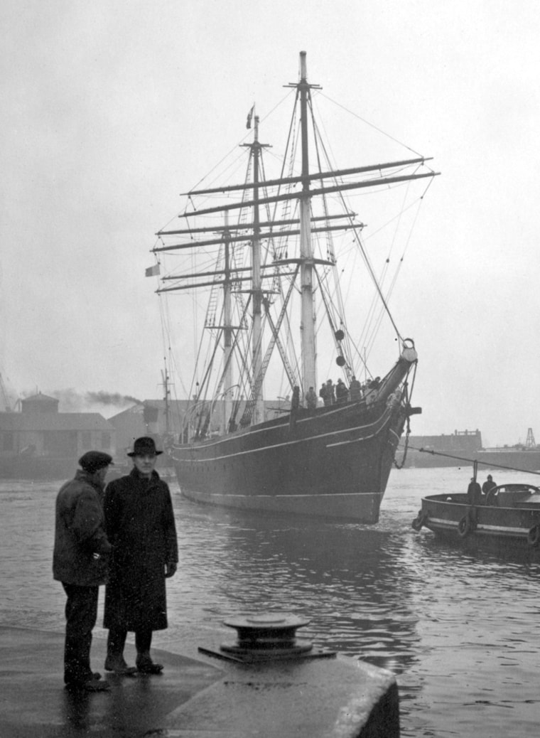 ** FILE **  File photo dated Feb. 18 1954 of the Cutty Sark being towed into east India Import Dock, London.   A spectacular early morning fire on Monday May 21 2007 caused heavy damage to the clipper ship Cutty Sark, adding millions to the cost of restoring one of London's proudest maritime relics.  The cause of the blaze was under investigation but within hours officials responsible for the graceful sailing ship said they were determined to carry on with a four-year restoration project.  (AP Photo / Tim Ockenden) ** UNITED KINGDOM OUT NO SALES NO ARCHIVE **