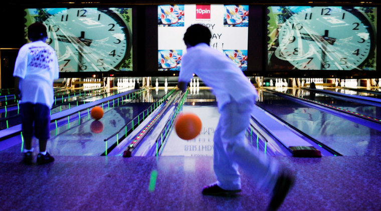Bowlers hit the lanes during a birthday party at the 10pin bowling alley in Chicago on May 22.