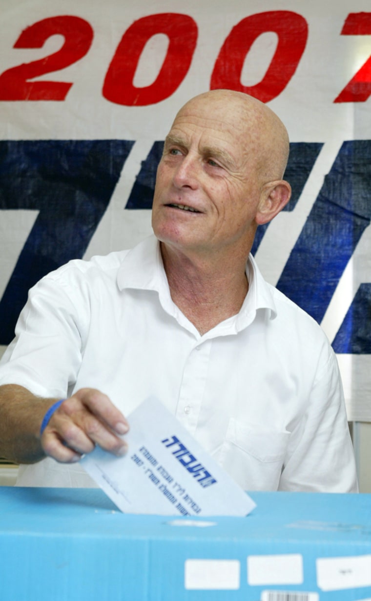 Israeli parliament member Ami Ayalon, one of the leading candidates to head Israel's Labor Party, casts his vote for the party's primary elections at a polling station in the northern Israeli town of Geva Carmel, Monday, May 28, 2007. Israel's Labor Party holds its leadership race on Monday, and the outcome could have a decisive impact on the stability of Prime Minister Ehud Olmert's government and his own political future. (AP Photo/Sebastian Scheiner)