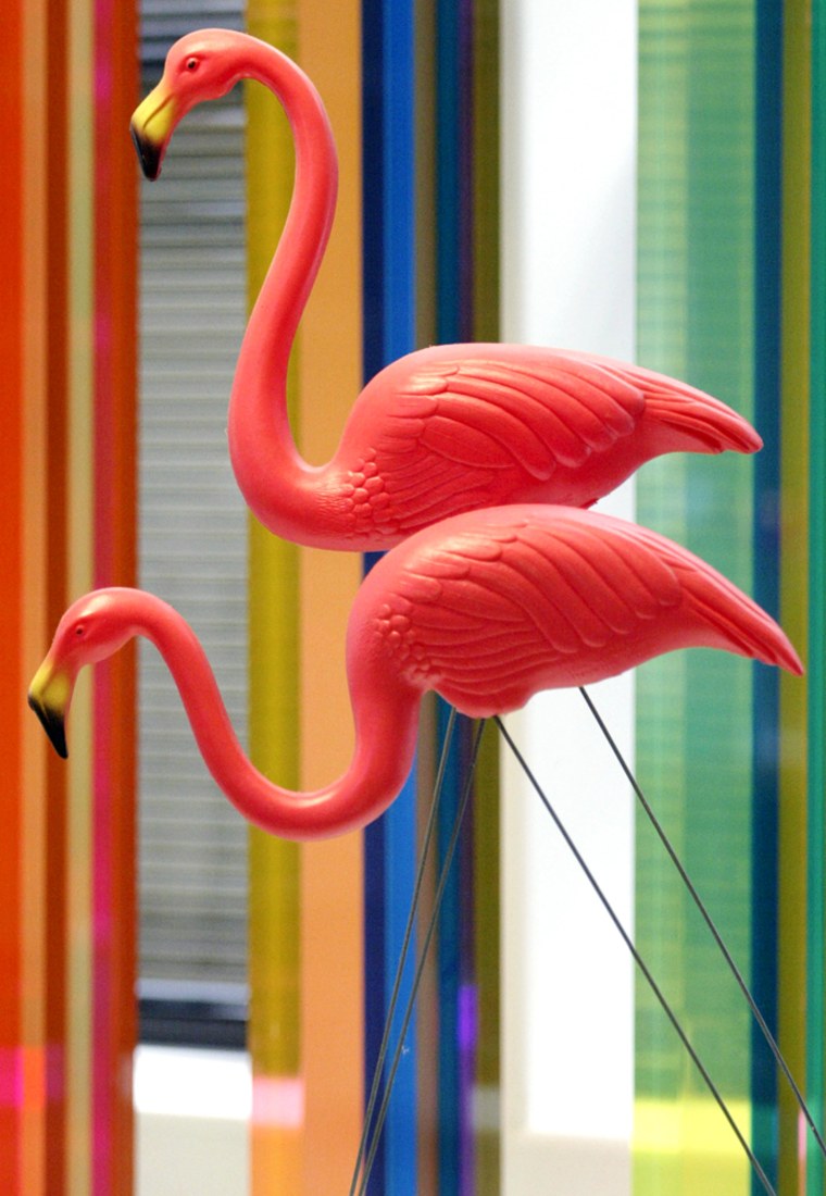 **FILE** Original pink plastic flamingos are seen on display at the National Plastics Center and Museum in this file photo taken Thursday, Oct. 26, 2006, in Leominster, Mass. An upstate New York manufacturer said Thursday, May 31, 2007, that he has bought the copyright and plastic molds to restart production of the orignial Don Featherstone-designed flamingo, picking up where Union Products Inc., left off last year when it shuttered its plastics factory in Leominster. (AP Photo/Bizuayehu Tesfaye, File)