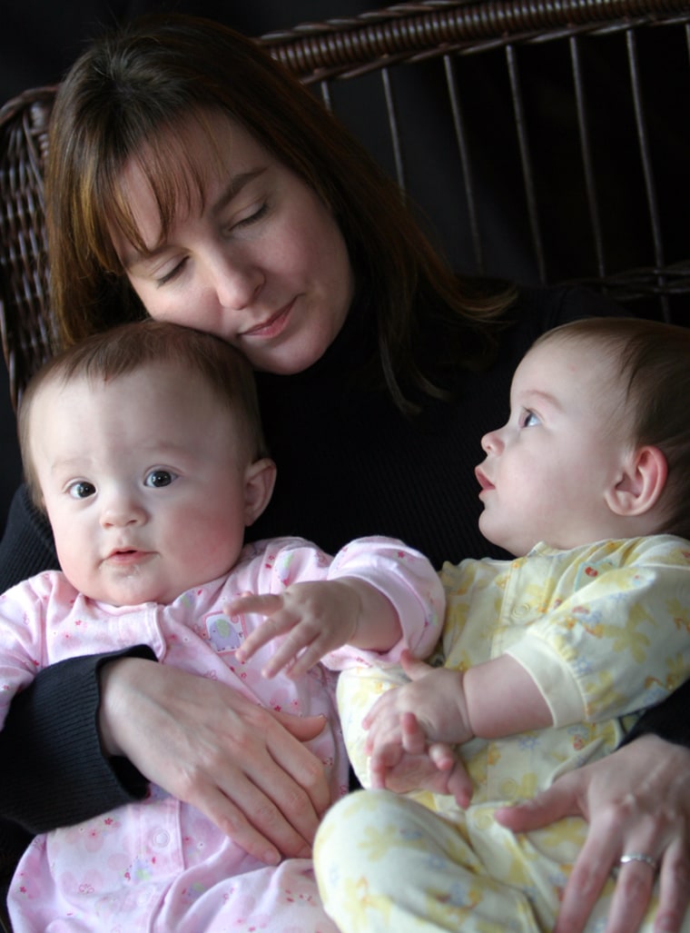 Shauna Anderson's quest for a baby took her to South Africa for a round of in vitro fertilization before she ended up adopting frozen embryos. Her twin daughters, Katherine and Molly, are now 1 year old.