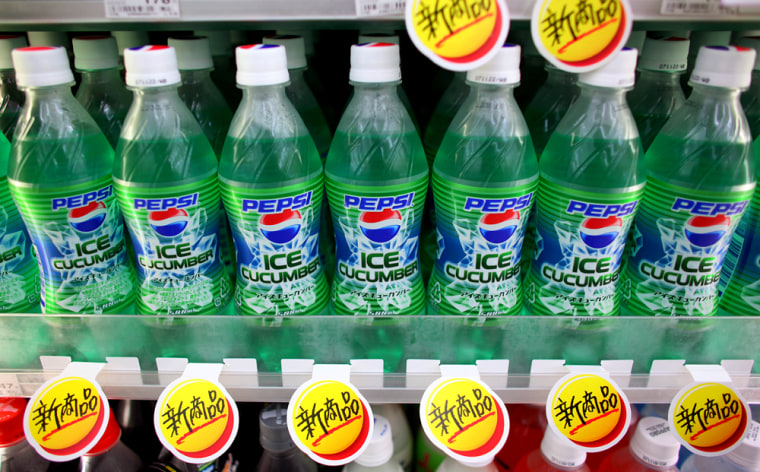 Bottles of Pepsi Ice Cucumber are seen on display at a convenience store in Tokyo this week. Japanese are staying cool as a cucumber this summer with the new garden-variety soda.