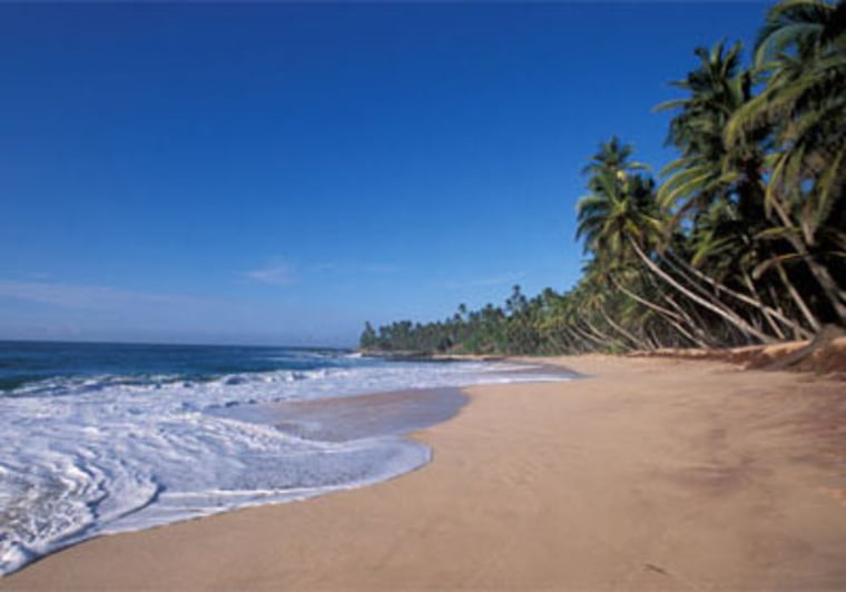 Amanwella beach in Sri Lanka is secluded and offers enough waves during the summer months to satiate most surfers.