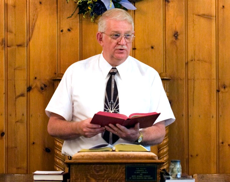 The Rev. Danny Fleming preaches at Big Isaac United Methodist Church in Big Isaac, W.Va. on May 20, 2007. Fleming, a part-time pastor, holds a full-time job with the U.S. Army in Clarksburg, W.Va., while he ministers to two churches some Sundays and three churches on other Sundays. 