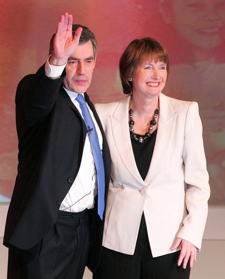 Gordon Brown, left, Britain's Treasury chief, who will become prime minister on Wednesday and Justice minister Harriet Harman acknowledge applause at a Labour leadership conference in Manchester England Sunday June 24, 2007. Brown vowed on Sunday to change Britain to meet new priorities, taking over from Tony Blair as leader of the Labour party days before he succeeds Blair as prime minister. Harman, who has called for the government to apologize for mistakes over the Iraq war, won a vote among 3.5 million party and labor union members and was named Brown's deputy.   (AP Photo/Martin Rickett/PA Wire)  ** UNITED KINGDOM OUT NO SALES NO ARCHIVE **