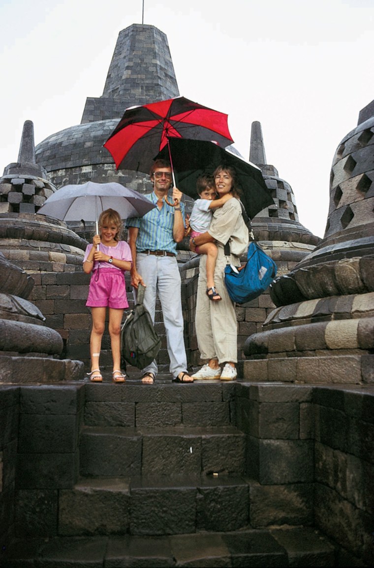 Founders of Lonely Planet, Tony and Maureen Wheeler, pose for a photo with their children at the Buddhist temple at Borobodur in Java, Indonesia. 
