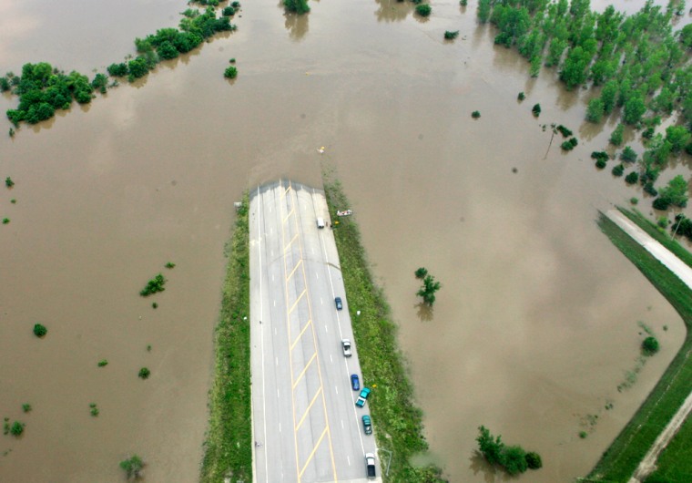 Main Street leading out of town ends at flood waters near Osawatomie, Kan., Monday, July 2, 2007.  (AP Photo/Orlin Wagner,pool)