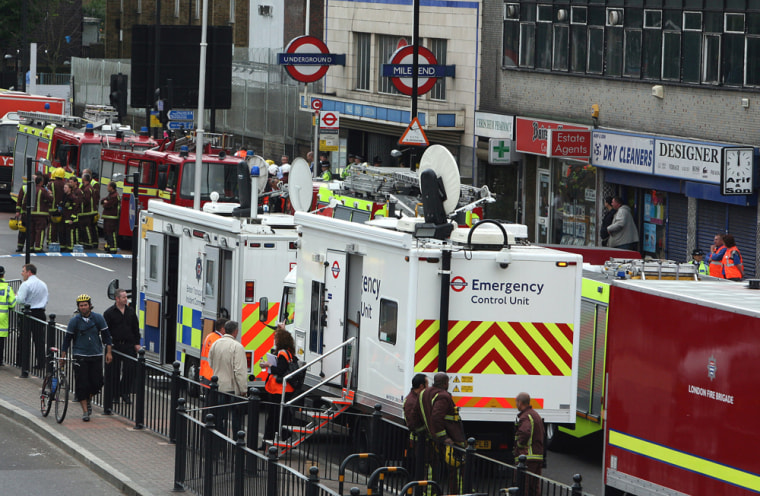 Emergency services wait outside Mile End tube station in London, after a tube derailed on the westbound Central line between Mile End and Bethnal Green on July 5. One person was injured in the accident and police have said the incident was not terror related. 