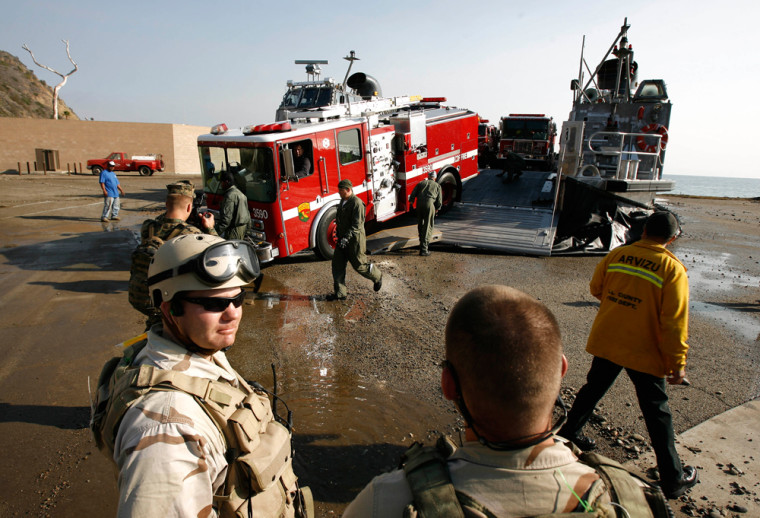 A California Department of Forestry fire truck is unloaded from a Navy hovercraft at Pebbly Beach heliport near Avalon, Calif., in May 2007. Weeks into a capricious fire season that has already burned parts of Catalina Island, Los Angeles and Lake Tahoe, swaths of California's flammable national forests are protected some days by nothing more than luck. 