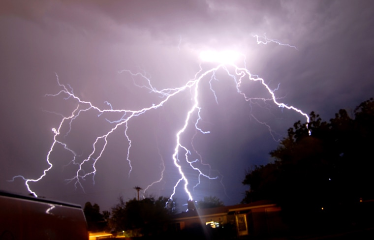 Lightning illuminates the night sky over Roswell, N. M., late Monday, July 2, 2007 as thunderstorms pass through the area. (AP Photo/Roswell Daily Record  Marl Wilson)