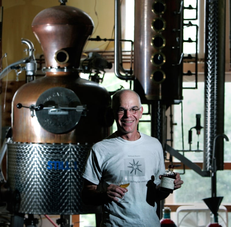 Ralph Erenzo poses in front of the still Tuthilltown Spirits in Gardiner, N.Y. Erenzo claims he and business partner Brian Lee run the first legal whiskey distillery in New York since Prohibition.