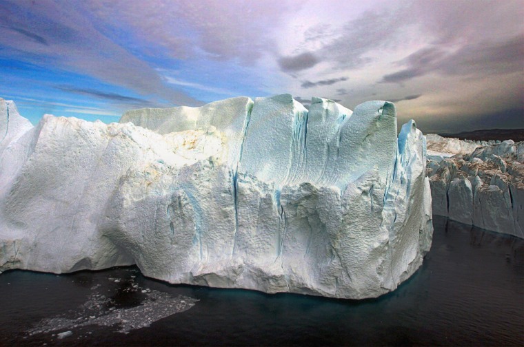 ** FILE ** A section of the ice sheet covering much of Greenland is seen in this Aug. 17, 2005 file photo. Scientists say the ice is thinning and blame global warming, predicting a 3-foot rise in ocean levels by the end of the century through a combination of thermal expansion of the water and melting of polar ice. (AP Photo/John McConnico, File)