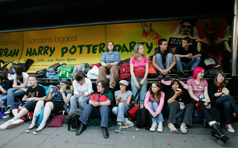 A group of Harry Potter fans from Belgium and the Netherlands line up outside Waterstone’s bookshop in central London to buy the first copies of J.K. Rowling’s new book ‘Harry Potter and the Deathly Hallows.’