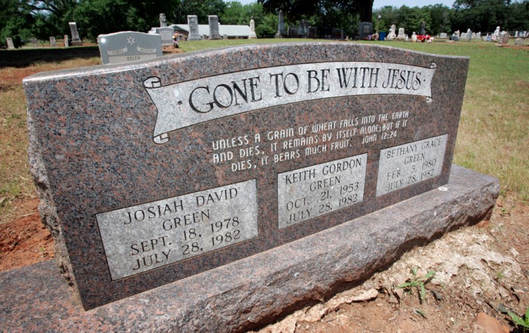The tombstone of spiritual singer Keith Green and his two children, Josiah and Bethany, stands in a cemetery in Garden Valley, Texas, on May 17.