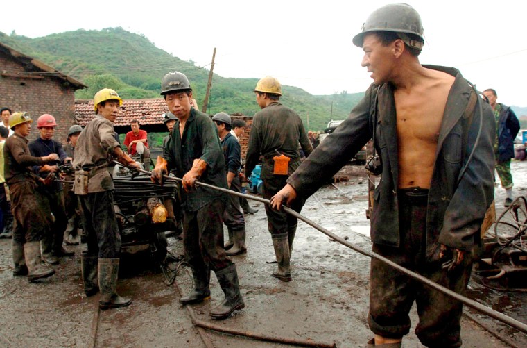 69 miners trapped in flooded China coal mine