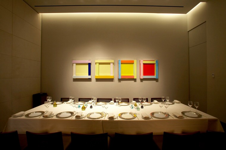 Axelle is one of two semi-private dining rooms featured inside RESTAURANT GUY SAVOY Caesars Palace.  The spacious room features seating for up to 12 and is  accented by rich, dark woods and colorful art by German artist, Imi Knoebel.