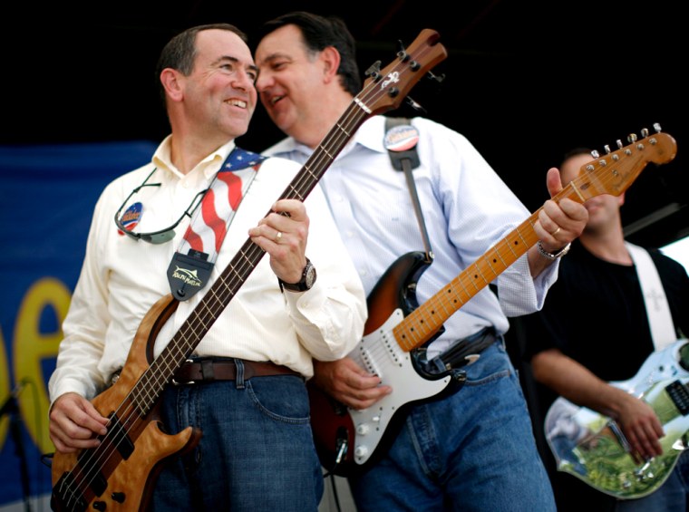 Republican Presidential Candidate and former Arkansas Governor Mike Huckabee laughs in Ames Iowa