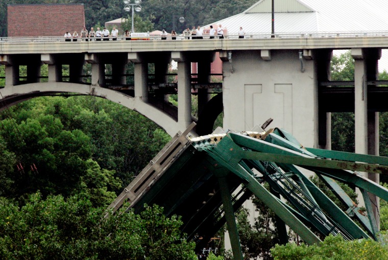 Minneapolis officials briefly opened a pedestrian bridge near the collapsed I-35W span on Wednesday, but it was closed after recovery workers called the move disrespectful to families of those still missing.
