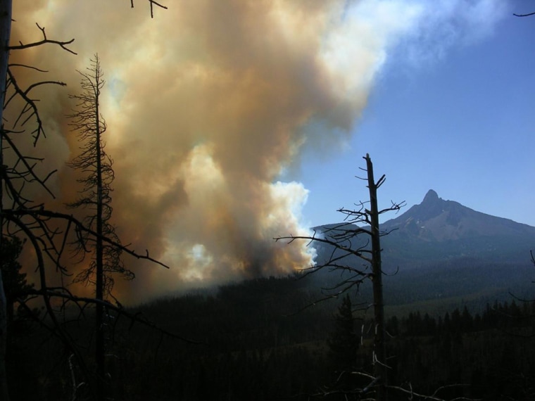 This fire near Sisters, Ore., threatens 1,200 homes in the Black Butte Ranch resort area.