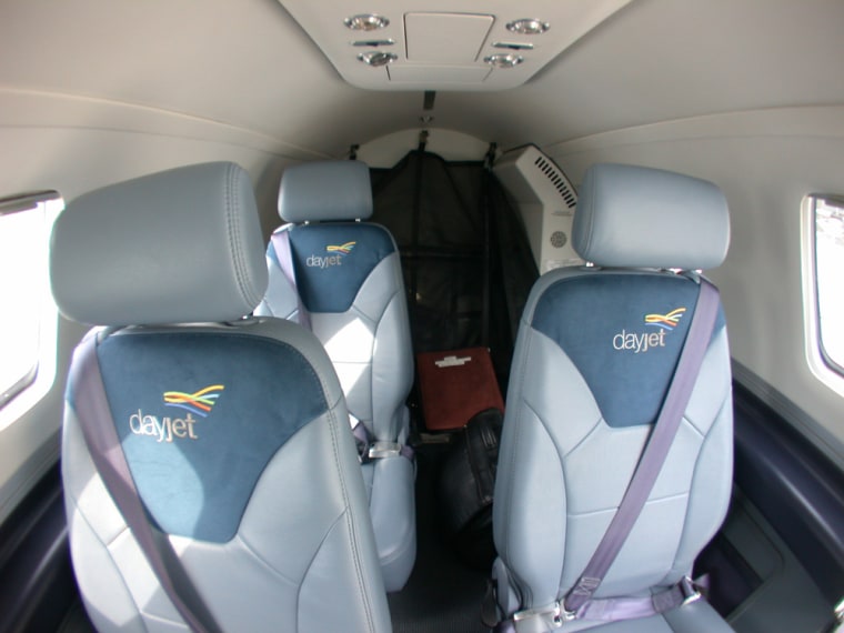The interior of an Eclipse 500 DayJet plane is shown on June 13, 2007 at the Boca Raton Airport in Boca Raton, Fla. Part of a new airplane category called \"very light jets,\" the Eclipse 500 carries three passengers at speeds up to 425 mph, faster than the average propeller plane its size. It is the centerpiece of DayJet, a startup airline with a business model that could popularize \"on demand\" business air travel, or end up as a great idea that didn't work. (AP Photo/Wilfredo Lee)