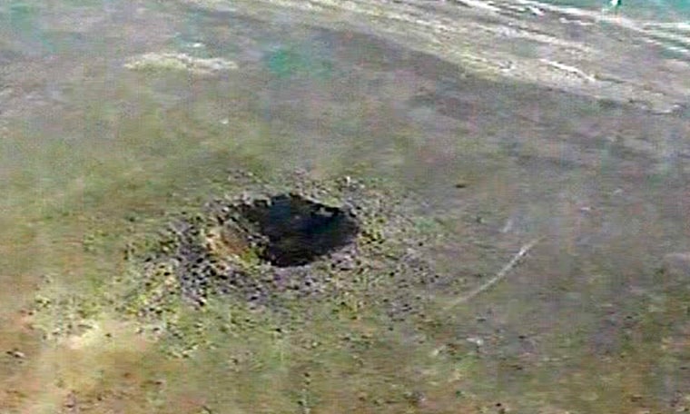 Video grab of the crash site near Zhezkazgan of the Proton-M booster rocket