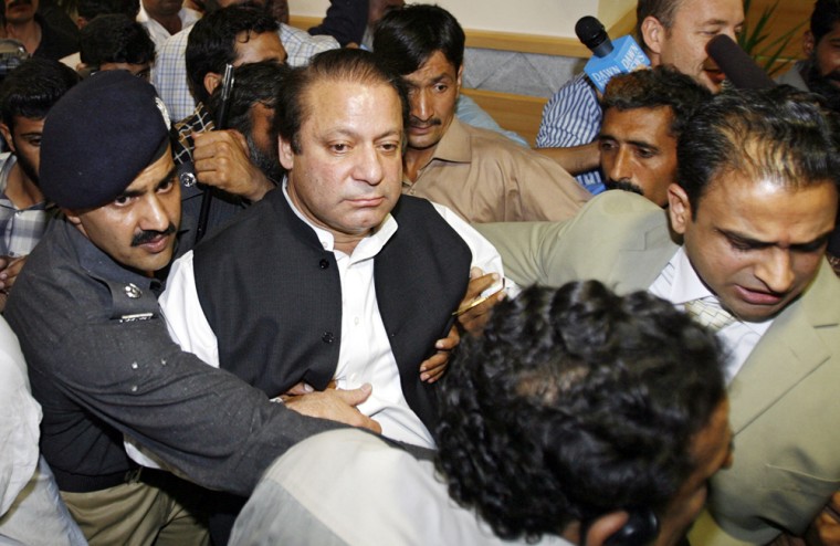 Former Pakistani prime minister Nawaz Sharif is arrested upon his arrival at Islamabad's airport