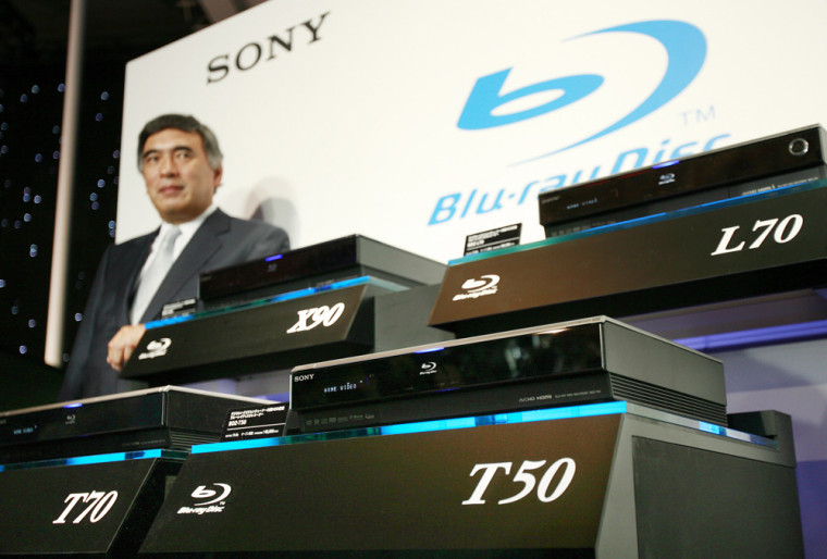 Sony executive vice president Katsumi Ihara poses by his company's new Blu-ray disk recorders at a Tokyo hotel, September 12, 2007. 