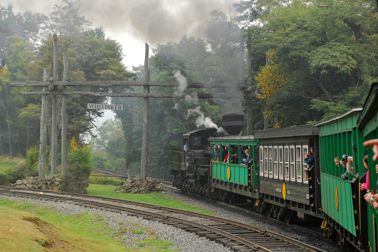 A passenger train from the Cass Scenic Railroad pulls into the Whittaker station, near Cass, W.Va. The railroad draws 40,000-70,000 tourists between May and October, opting for the five-hour journey to Bald Knob, West Virginia's third-highest peak. 