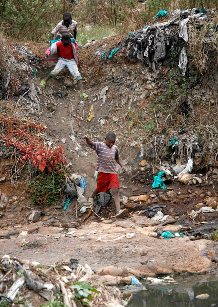 Children play at Dandora rubbish dump in Nairobi