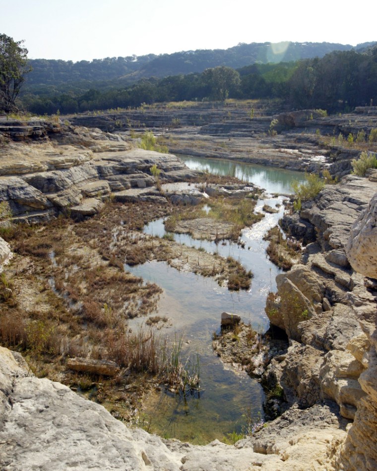 The gorge below the spillway of Canyon Lake in Texas was created by three days of flooding in 2002.