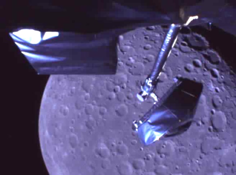 This Oct. 5 image from the Kaguya orbiter's camera shows the spacecraft's high-gain antenna in the foreground, and the cratered surface of the moon in the background.