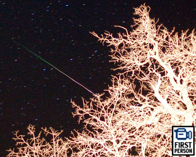 Photographer Joe Klein captured this Orionid meteor streak just after midnight on Oct. 23, 2006, from the hills to the east of San Diego. The overexposed view of tree branches in the foreground add to the Halloween-season spookiness.