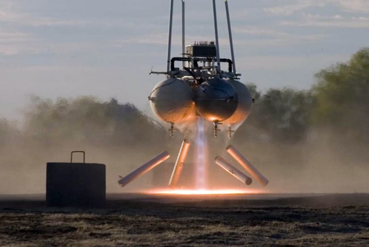Armadillo Aerospace's Pixel lunar lander entry hovers above its launch pad during a test.
