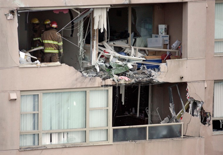 Probe begins after plane crashes into building