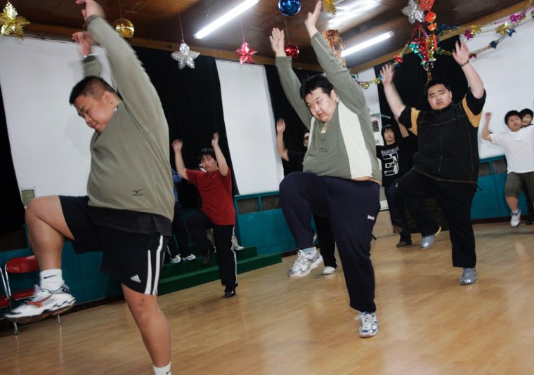 Patients perform aerobics at the Aimin Fat Reduction Hospital in the city of Tianjin