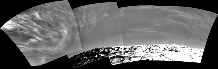 Clouds add drama to the sky above \"Endurance Crater\" in this mosaic of frames taken by the navigation camera on NASA's Mars Exploration Rover Opportunity at about 9:30 a.m. on the rover's 290th sol (Nov. 16, 2004). The view spans an arc from east on the left to the southwest on the right. 

These clouds are part of a band that forms near the equator when Mars is near the part of its orbit that is farthest from the Sun. For Opportunity (and Spirit and the rest of the southern hemisphere), this occurs in late fall and early winter. During this period, atmospheric temperatures and the amount of water vapor combine to form large-scale clouds. These clouds look like Earth's cirrus clouds and share other similarities with cirrus clouds in that they are believed to be composed entirely of water-ice particles with sizes on the order of several micrometers (a few ten-thousandths of an inch).