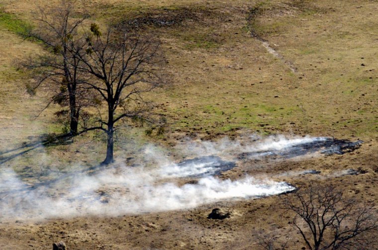 Image: brush fire started by a falling piece of debris