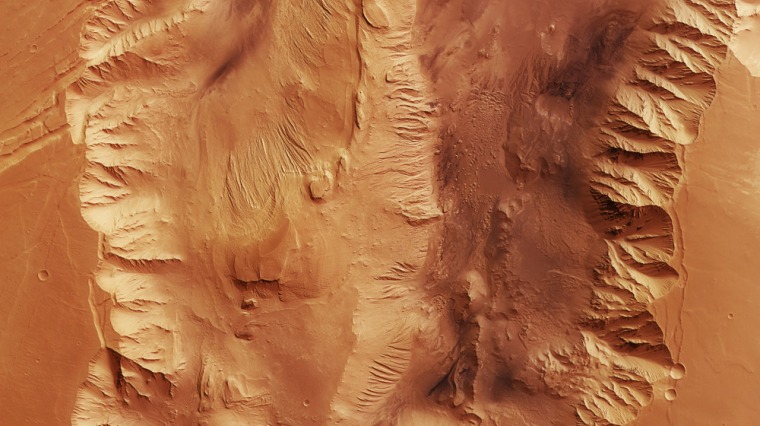 Light-toned layered deposits in the plains around Valles Marineris show different features from those inside the canyon; these features suggested that water continued to flow on a large scale in these plans after the Noachian, into the Hesperian epoch of Mars, until about 3.7 billion to 3 billion years ago. 
