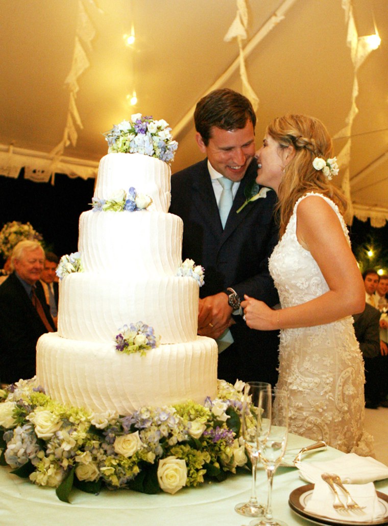 Henry and Jenna Hager pause as they cut their wedding cake Saturday, May 10, 2008, during a reception in their honor following the ceremony at Prairie Chape Ranch near Crawford, Texas.  White House photo by Shealah Craighead