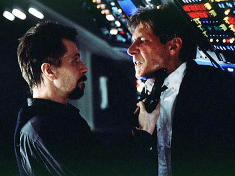 Harrison Ford in Air Force One 1997.   Gary Oldman, left.