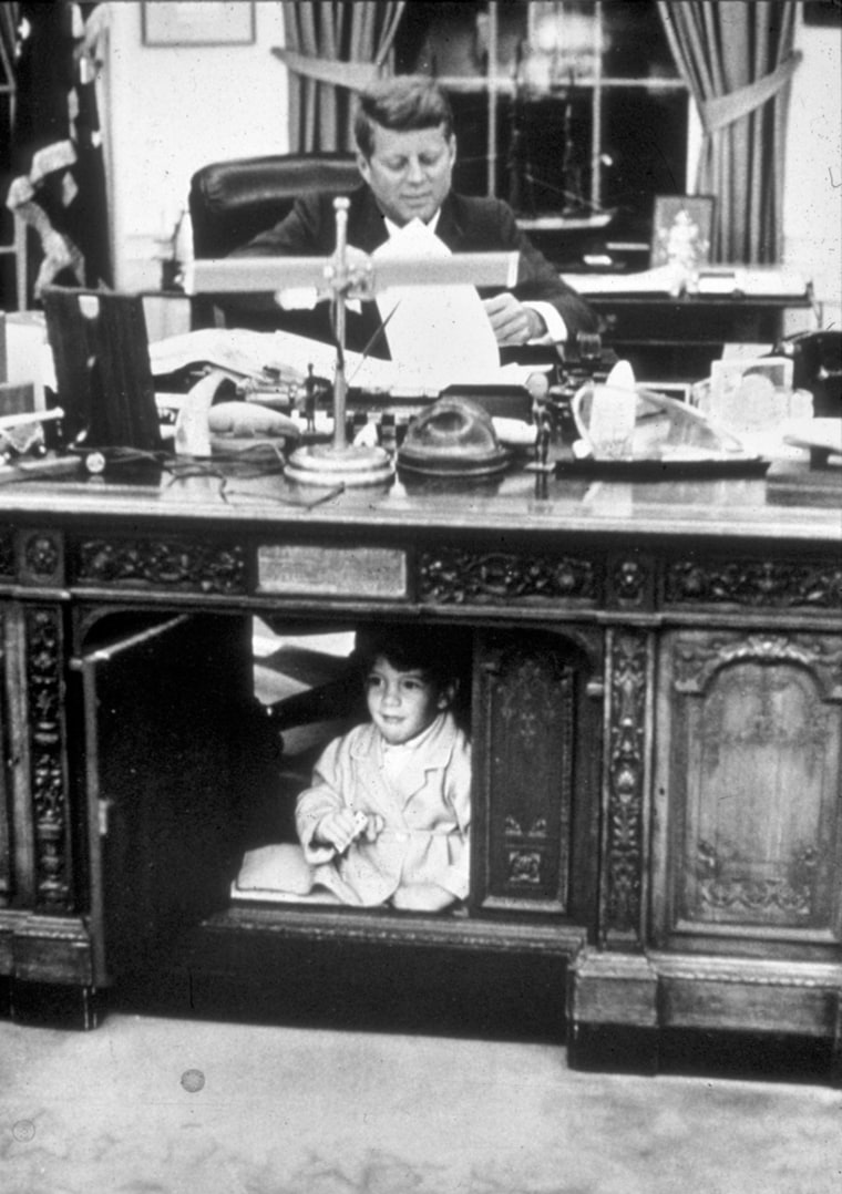 John Kennedy Jr. playing in the Oval Office